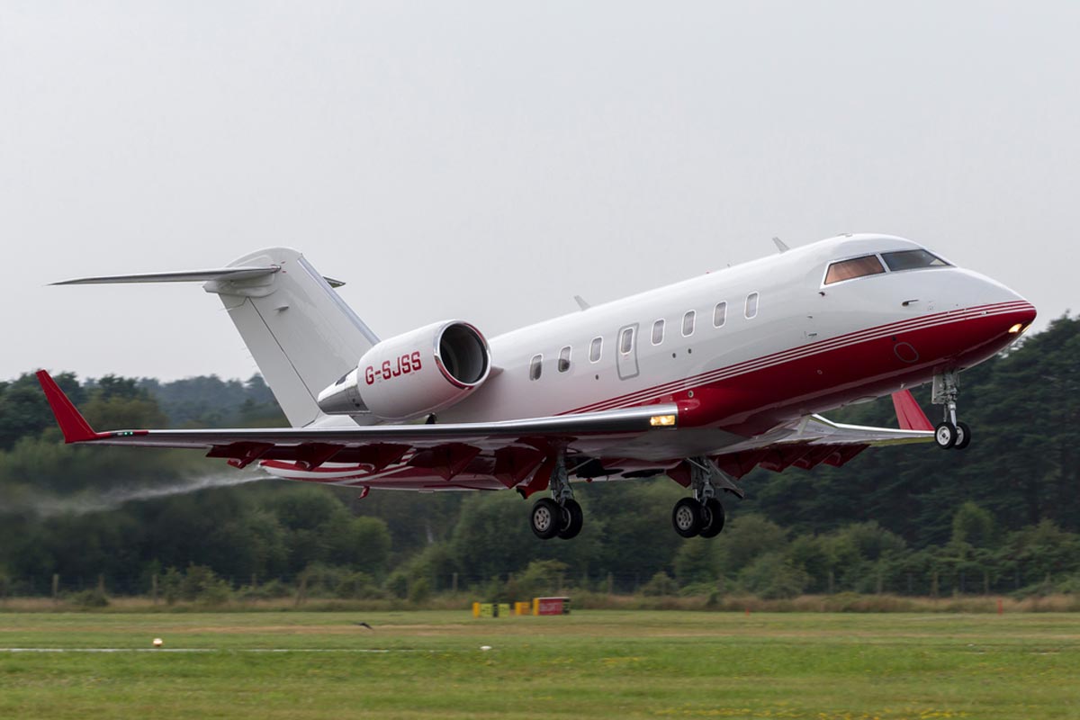 A Bombardier Challenger 605 large private jet landing.