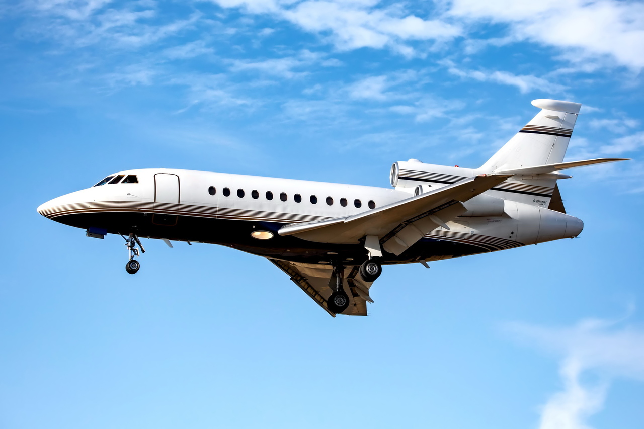 Falcon 900B private jet charter'
